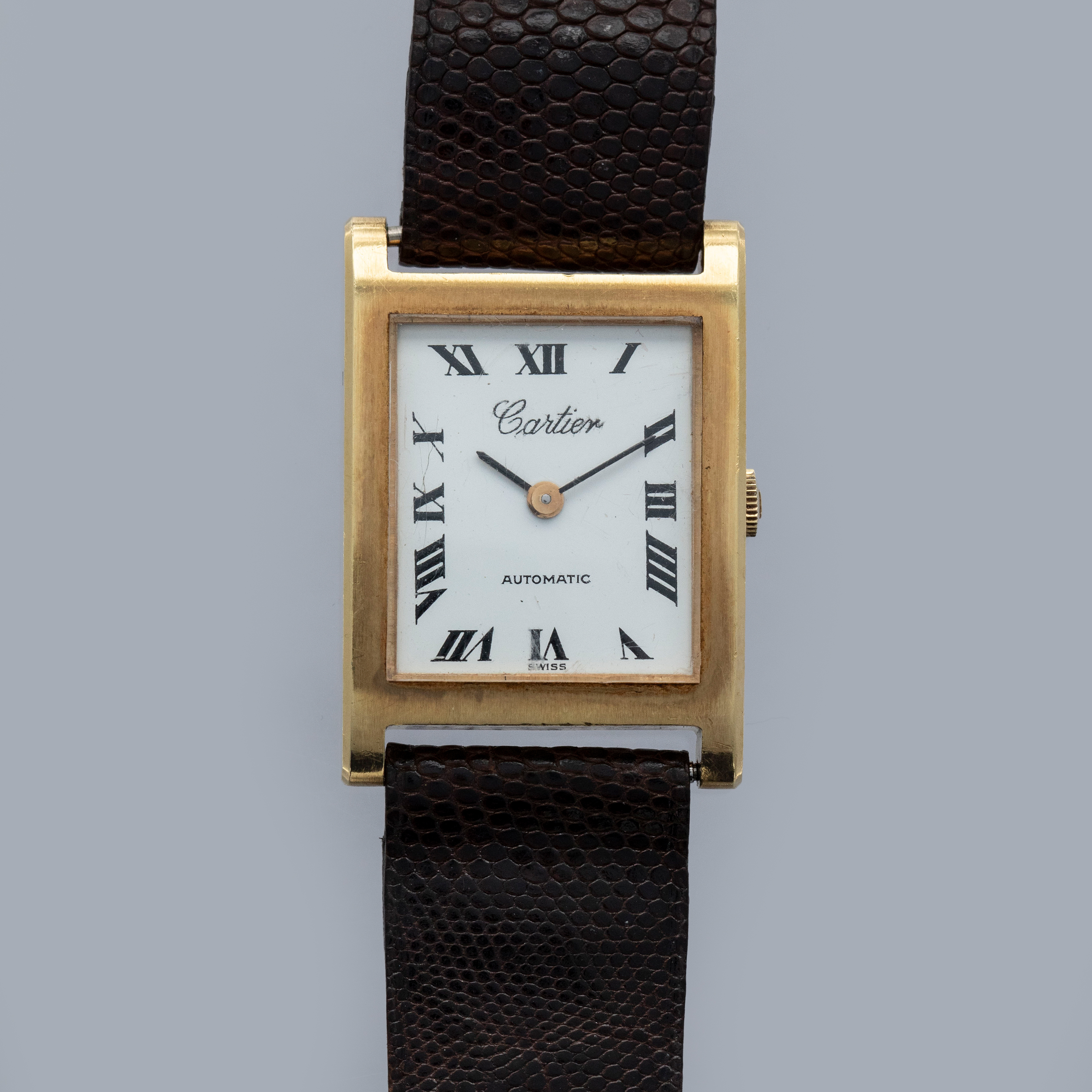 Cartier Tank 124102/3 by Universal Geneve 18k YG | Auctions