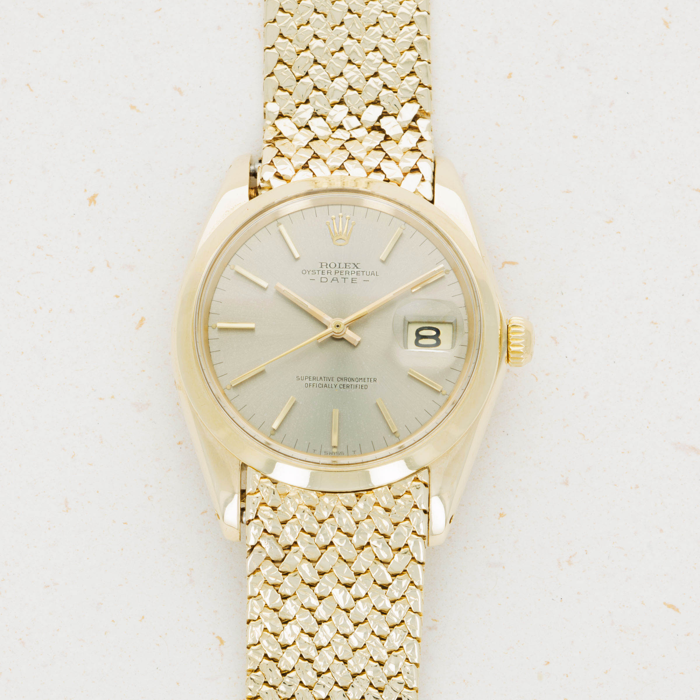Rolex Oyster Perpetual Date 1500 14k Gold on Woven Bracelet Auctions Loupe This